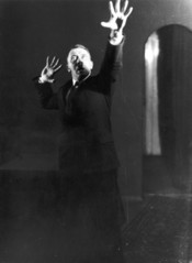 Adolf+Hitler+Posing+to+a+Recording+of+His+Own+Speeches+1925+3.jpeg