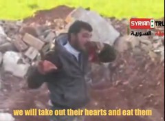 syria_rebel_eating_heart_2_1368528897_540x540.jpg