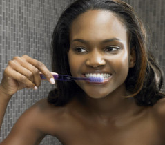 black-woman-brushing-teeth.jpg