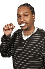 14880665-black-african-american-man-practicing-good-oral-dental-care-b