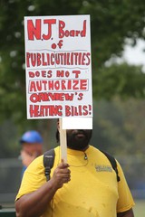 Michael Worthy Holds Sign from Orig source-face edit out.jpg