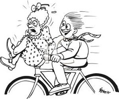 A_Man_Giving_an_Elderly_Woman_a_Ride_on_Bicycle_Handlebars_Royalty_Fre