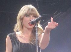 Taylor swift gives middle finger.jpg