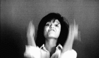 A-Young-Angelina-Jolie-Flipping-The-Bird-In-Bed.gif