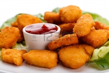 24939588-chicken-nuggets-on-white-b.jpg