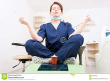 dentist-woman-meditating-yoga-lotus.jpg