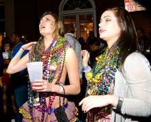 Mardi Gra beads on two gals.jpg