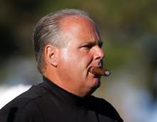 Rush Limbaugh Smokes Cigar.jpg