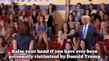 Hand raised Victims of Trump gif.gif