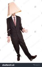 stock-photo-a-man-with-a-lampshade-.jpg