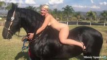 Nude blonde on a horse_.jpg