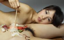 Sushi Japanese girl enjoying withou.jpg